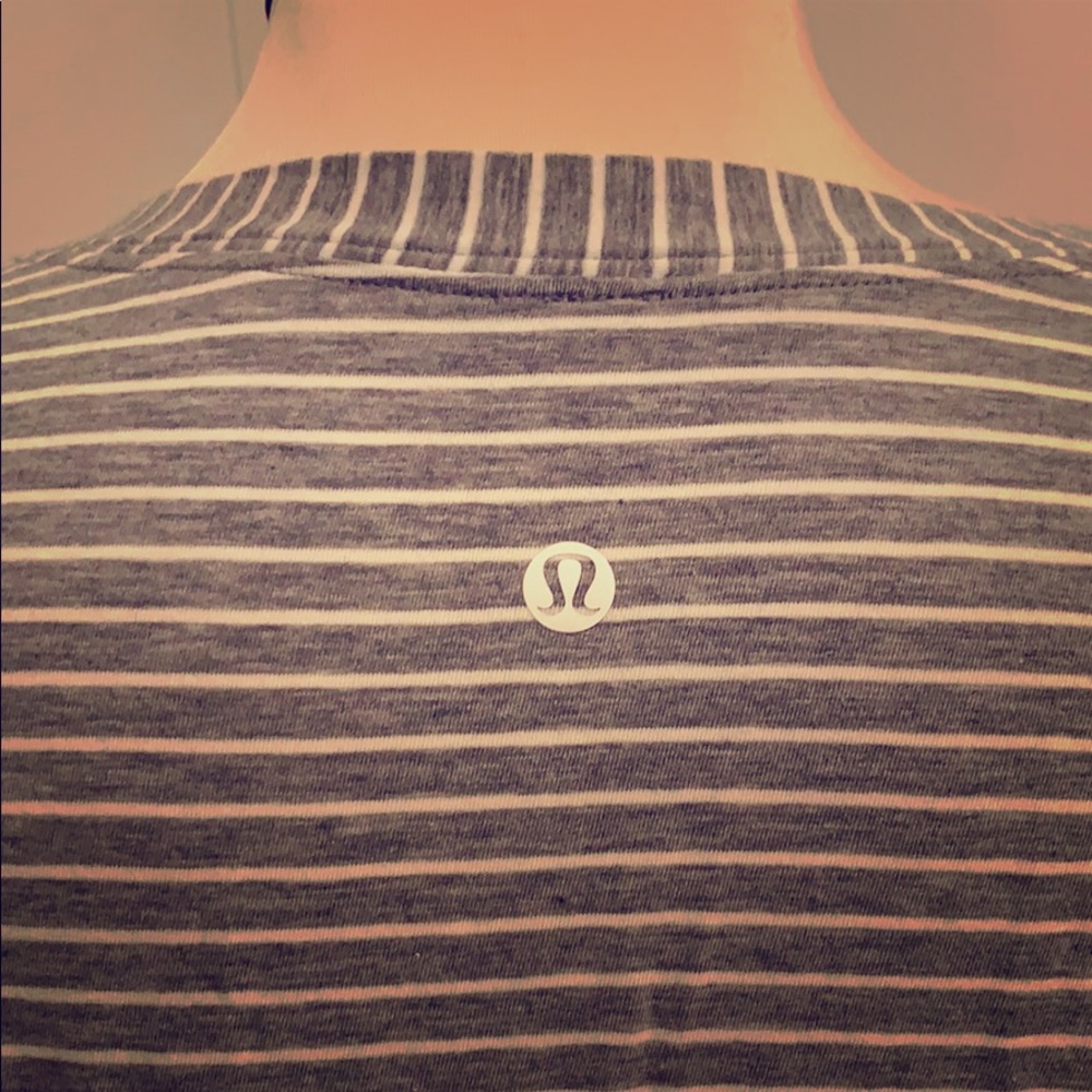 Grayish-Blue and white striped Lulu Lemon top.